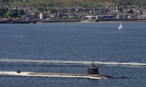 Submarine with escort heading towards Faslane